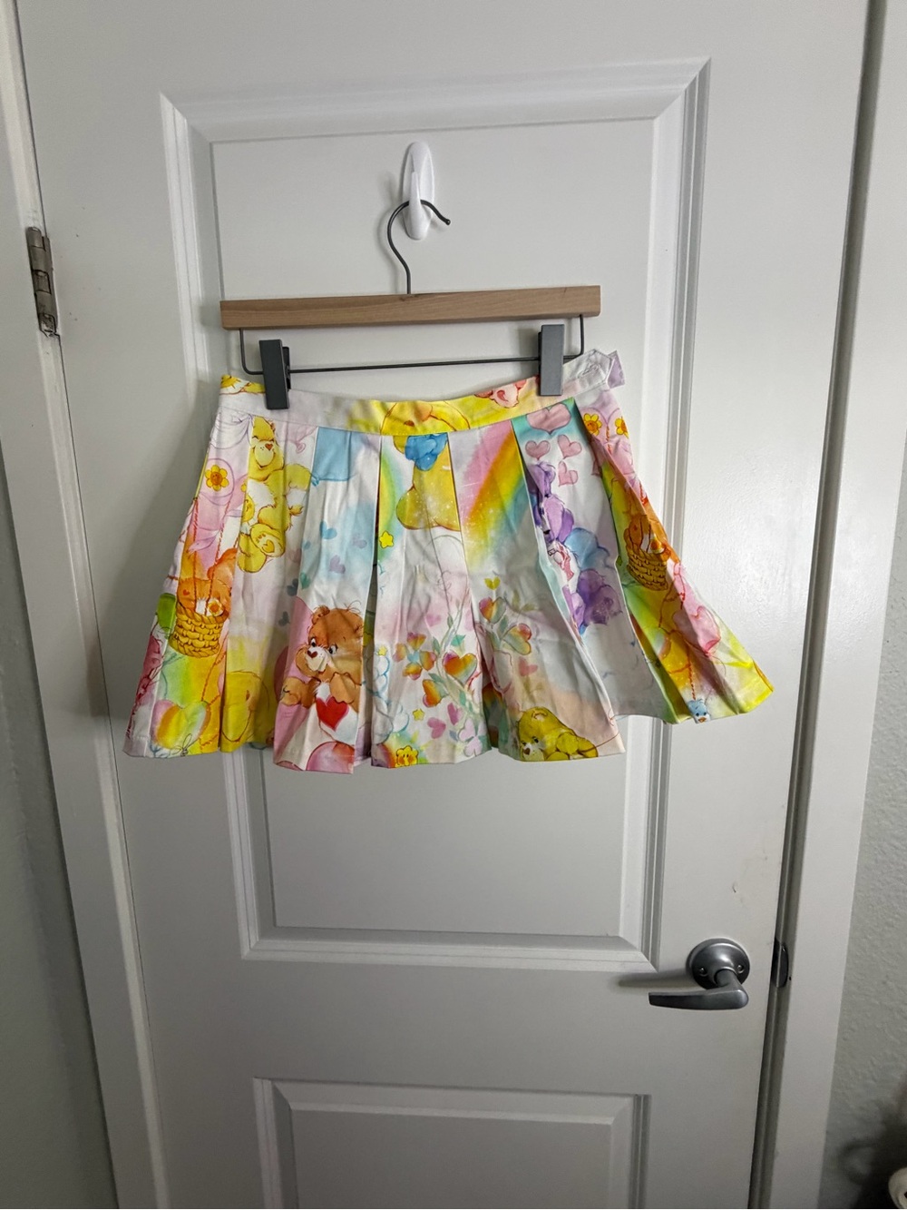 Dolls Kill Pastel Care Bear Pleated Skater Skirt - Pink, Yellow, Blue, Purple